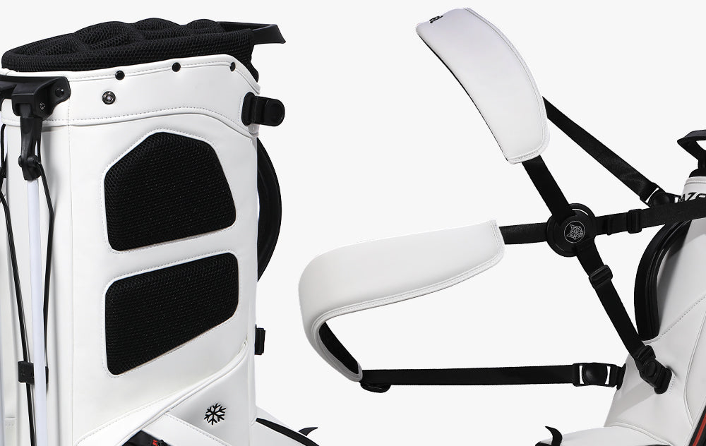 Golf bag with adjustable dual shoulder straps and thick hip pads for balanced carrying comfort during walking rounds