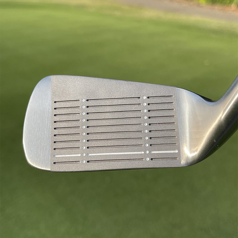 Close-up of MAZEL 55 Degree Black Golf Chipper Clubface on golf turf – precision-milled face for consistent short game shots
