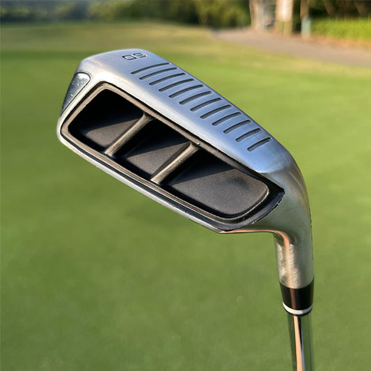Front view of MAZEL 60 Degree Black Golf Chipper Club on golf turf – sleek design for improved short game accuracy and control